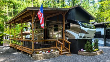 Fifth Wheel RV Setup With a Large Wooden Deck