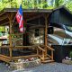 Fifth Wheel RV Setup With a Large Wooden Deck