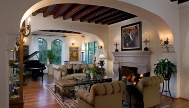 Beautiful Hacienda Living Rooms With Arches, Beams, and Cozy Fireplaces