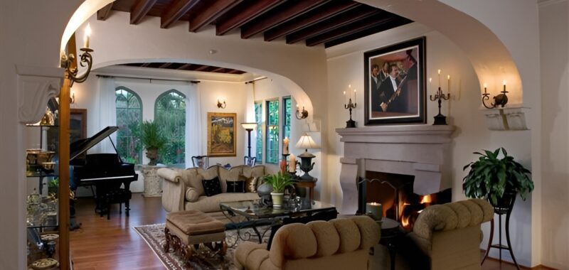Beautiful Hacienda Living Rooms With Arches, Beams, and Cozy Fireplaces