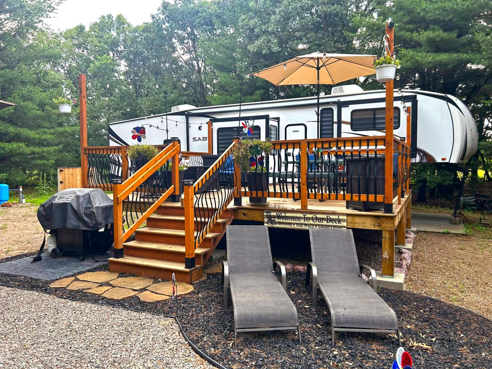 Permanent-RV-Camper-Outdoor-Set-Up Sabre’s Sun Deck Oasis