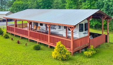 RV Trailer With a Wraparound Porch