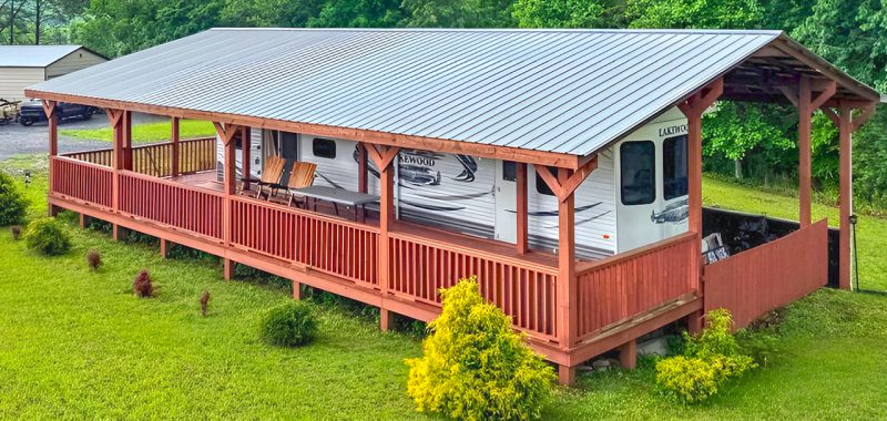 RV Trailer With a Wraparound Porch