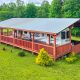 RV Trailer With a Wraparound Porch
